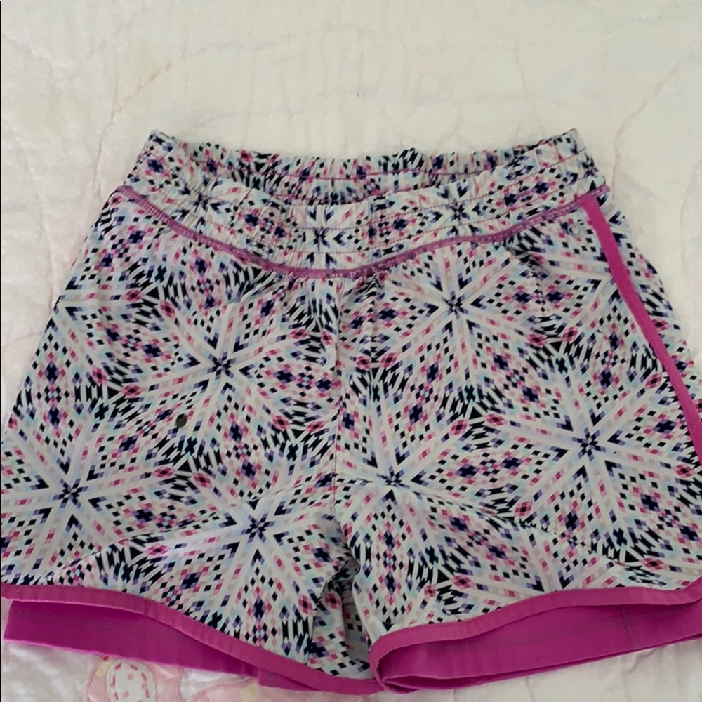 Vibrant geometric print athletic shorts